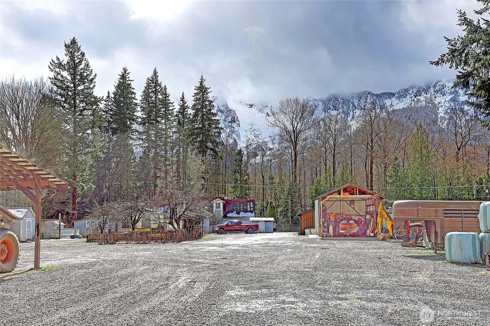 39729 State Rte 530 Northeast Arlington, WA 98223 - Photo 31 of 40 a backyard of a house with table and chairs