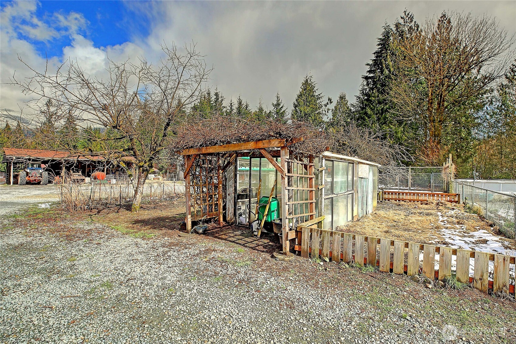 39729 State Rte 530 Northeast Arlington, WA 98223 - Photo 35 of 40 a view of a house with a yard and wooden fence