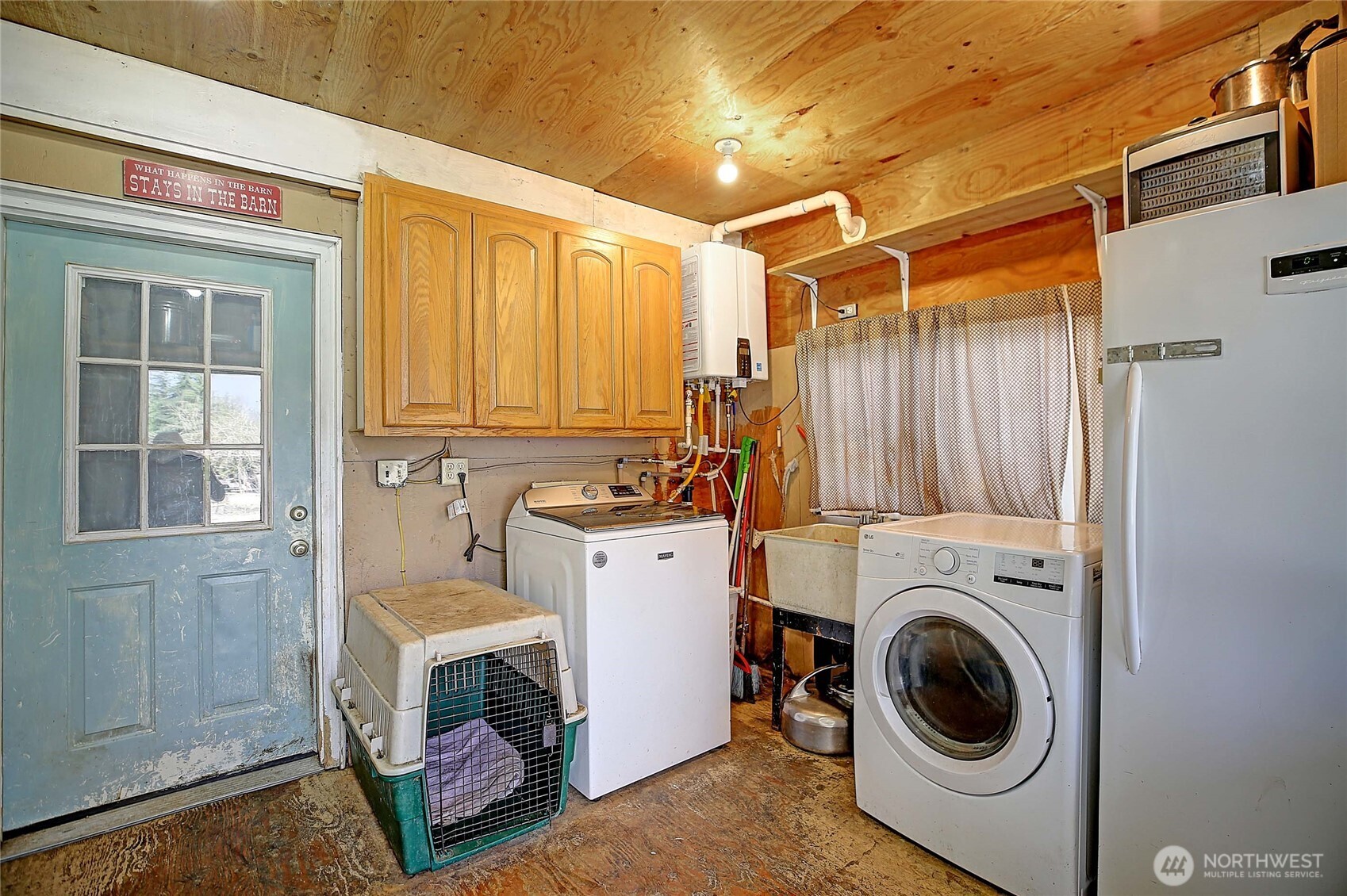 39729 State Rte 530 Northeast Arlington, WA 98223 - Photo 39 of 40 a utility room with dryer and washer