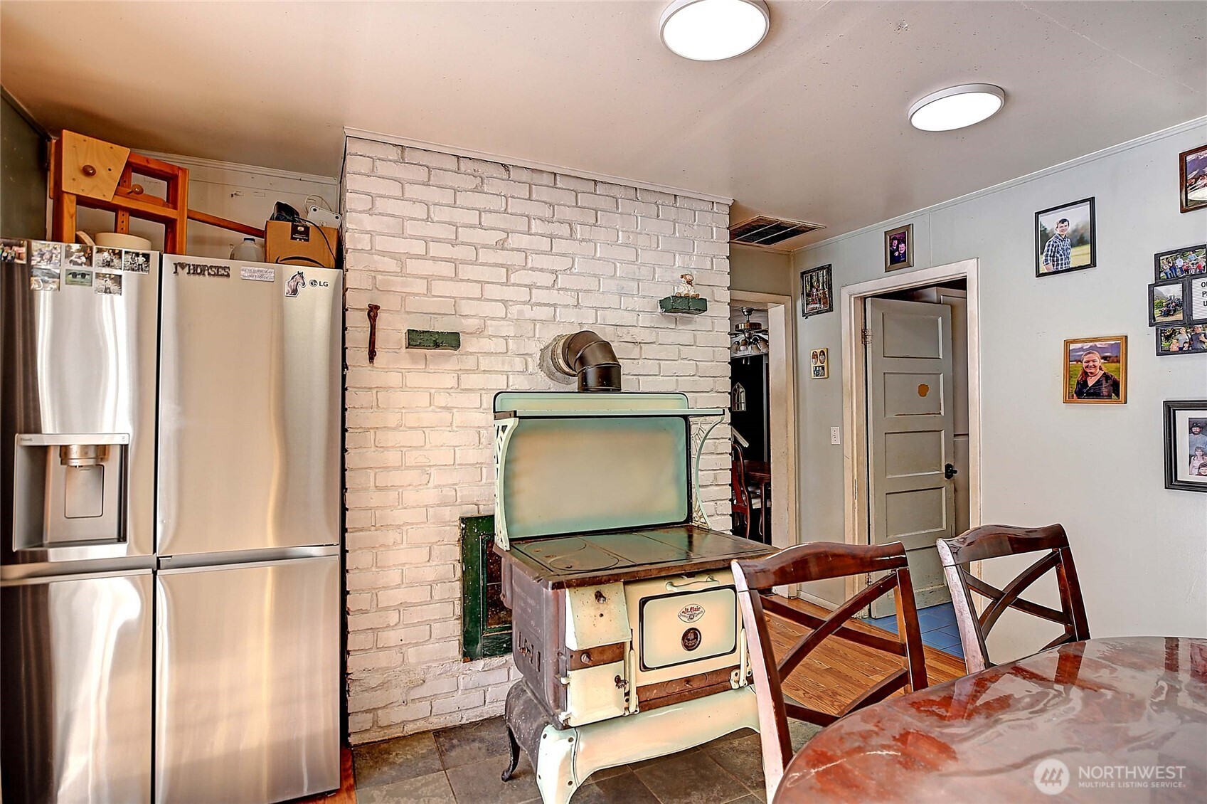 39729 State Rte 530 Northeast Arlington, WA 98223 - Photo 5 of 40 a living room with furniture and a flat screen tv