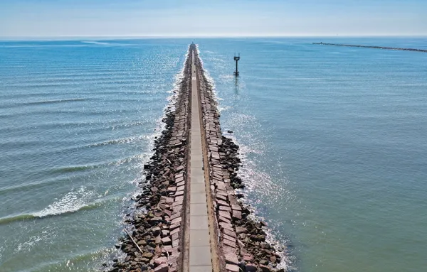 a view of a lake with a city