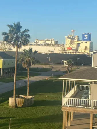 a view of a balcony with ocean view