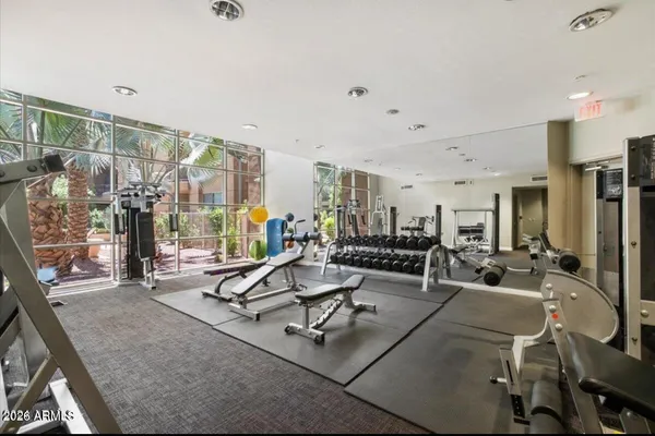 a view of a room with gym equipment