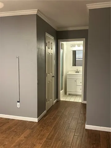 a view of a bathroom with a tub and shower