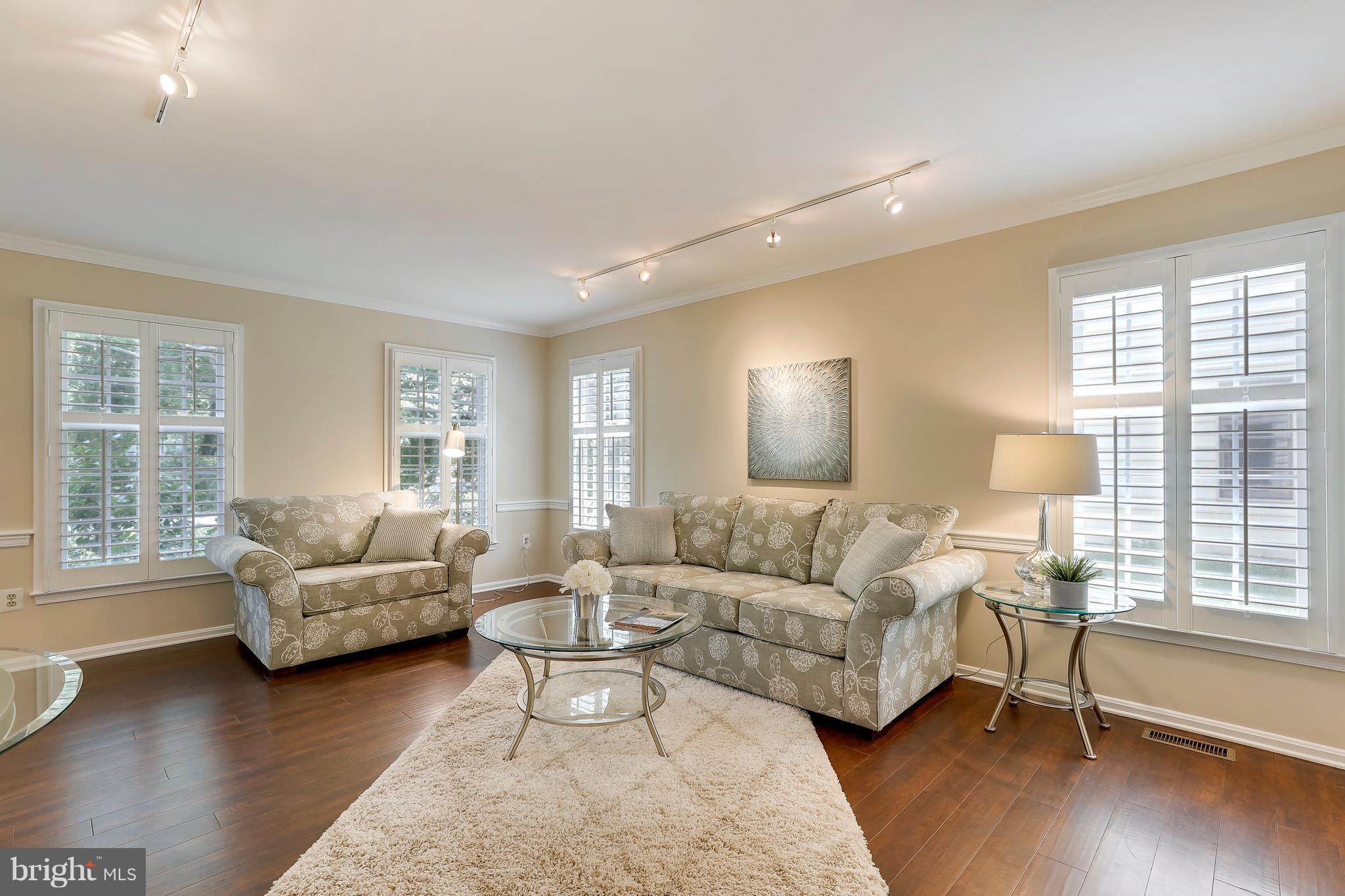 1476 Sharps Point Road Annapolis, MD 21409 - Photo 12 of 30 a living room with furniture and a large window