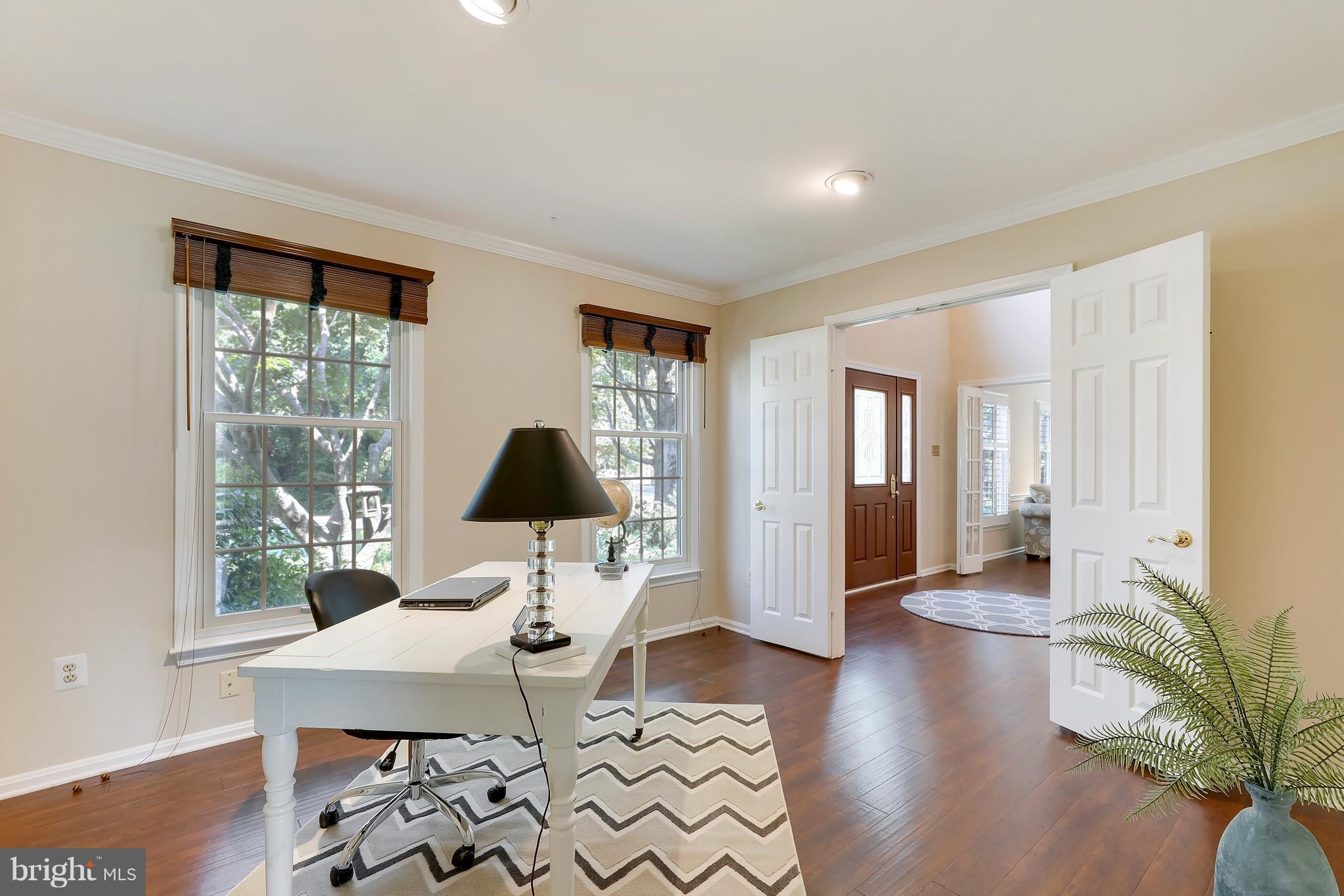 1476 Sharps Point Road Annapolis, MD 21409 - Photo 14 of 30 a workspace with wooden floor and a window