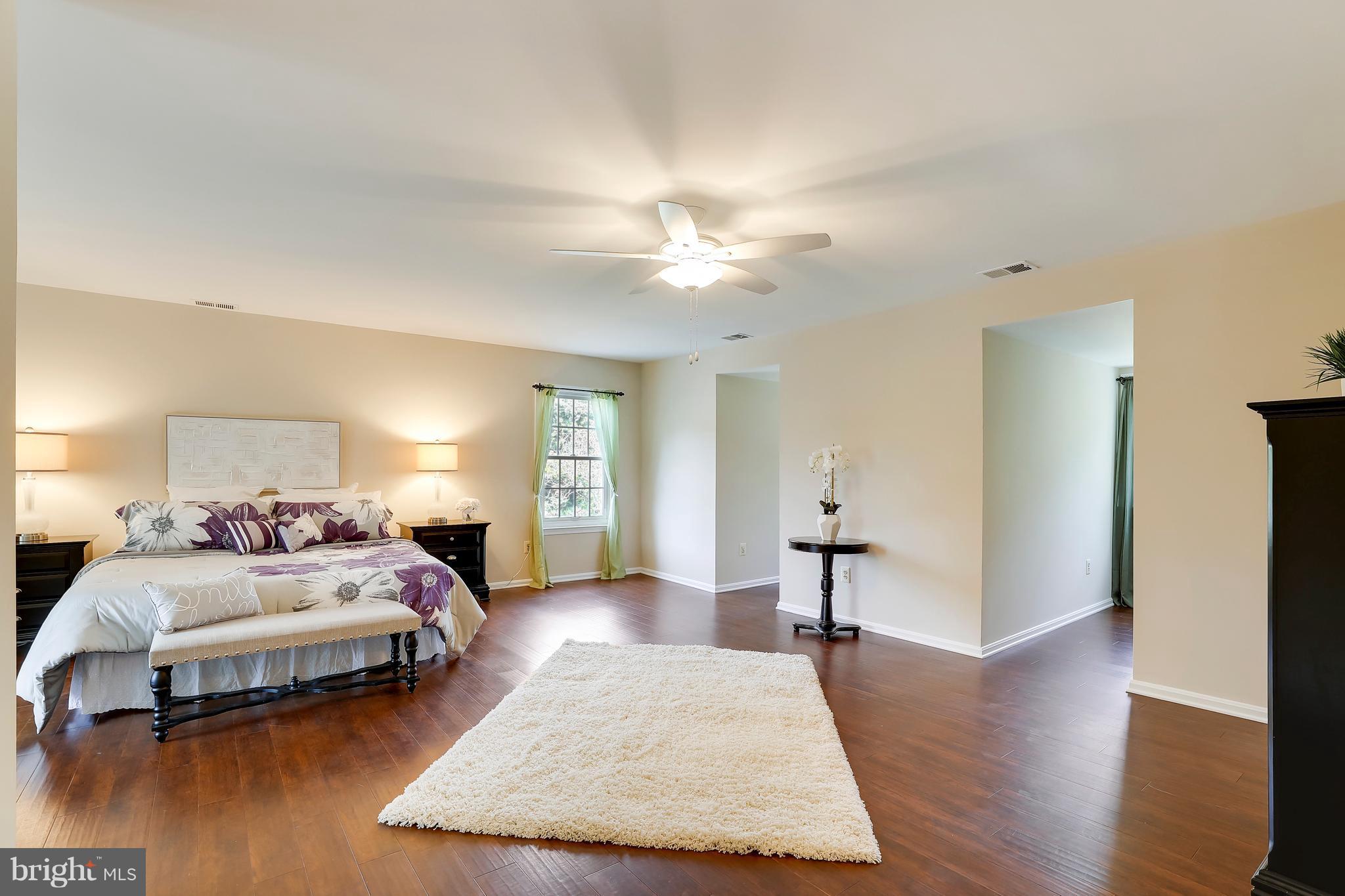 1476 Sharps Point Road Annapolis, MD 21409 - Photo 16 of 30 a bedroom with a bed and window
