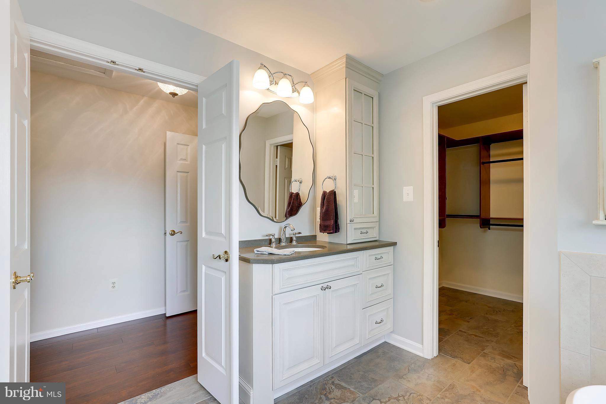 1476 Sharps Point Road Annapolis, MD 21409 - Photo 18 of 30 a view of a mirror light fixtures and entryway