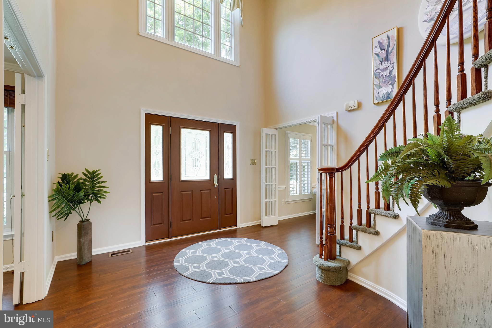 1476 Sharps Point Road Annapolis, MD 21409 - Photo 3 of 30 a view of entryway and hall with wooden floor