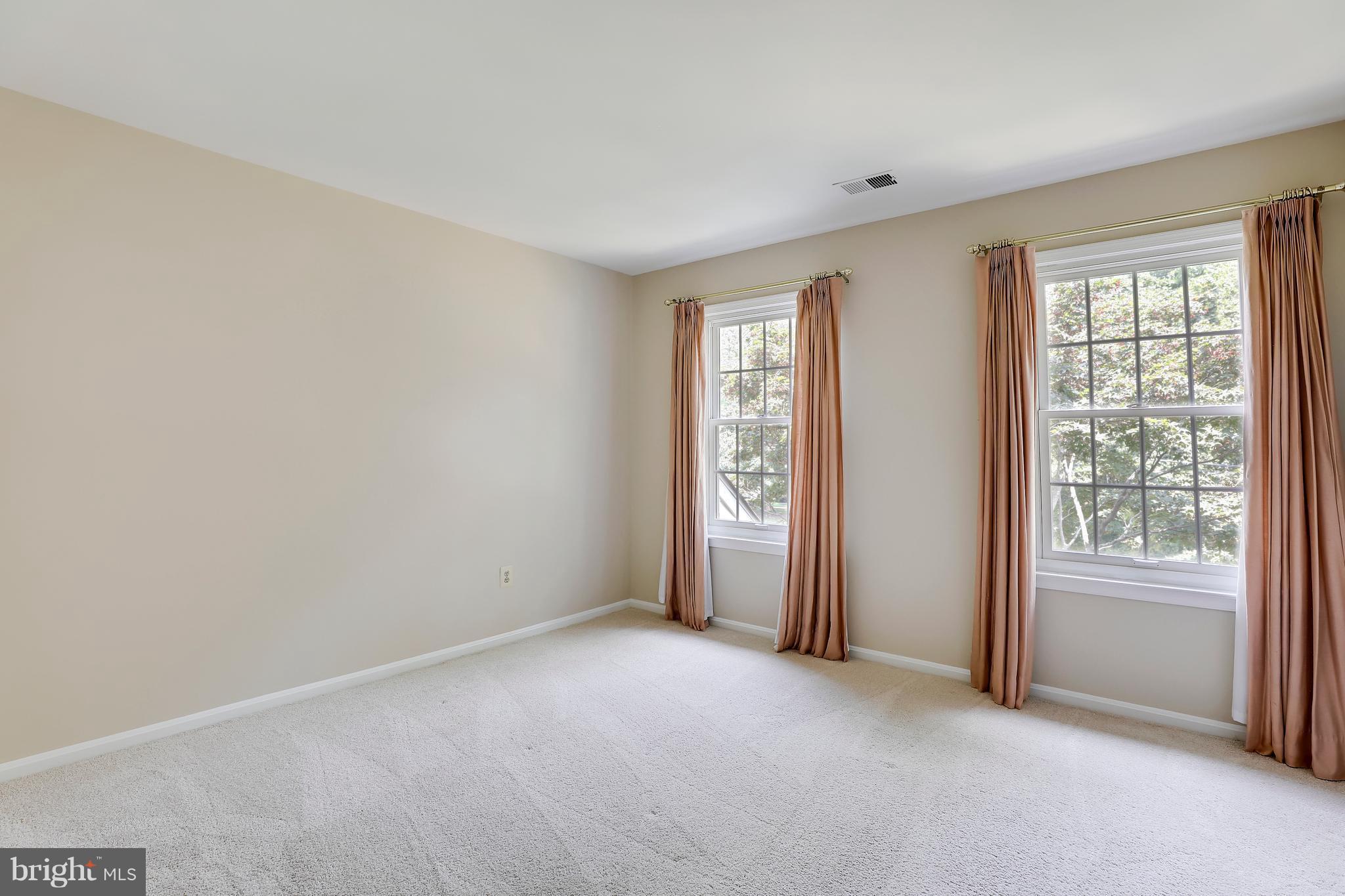 1476 Sharps Point Road Annapolis, MD 21409 - Photo 22 of 30 an empty room with windows