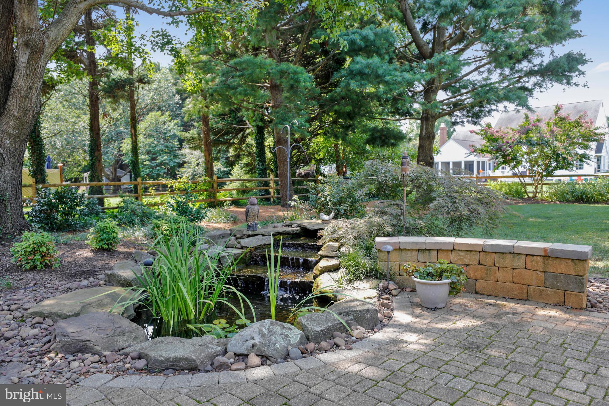1476 Sharps Point Road Annapolis, MD 21409 - Photo 30 of 30 a view of backyard with outdoor seating and green space