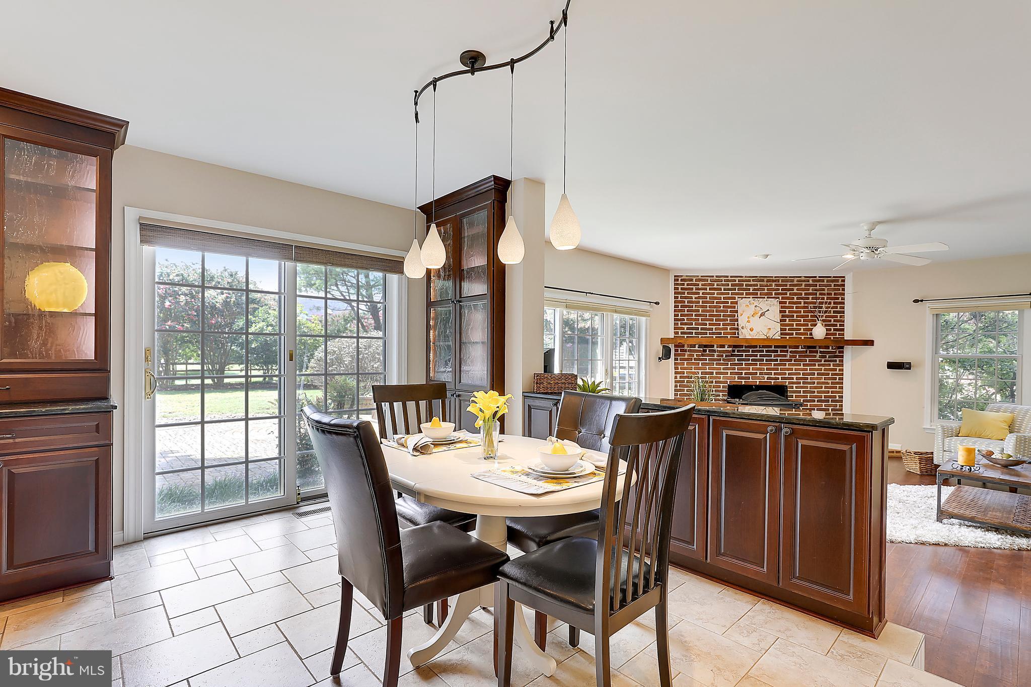 1476 Sharps Point Road Annapolis, MD 21409 - Photo 7 of 30 a view of a dining room with furniture window and outside view