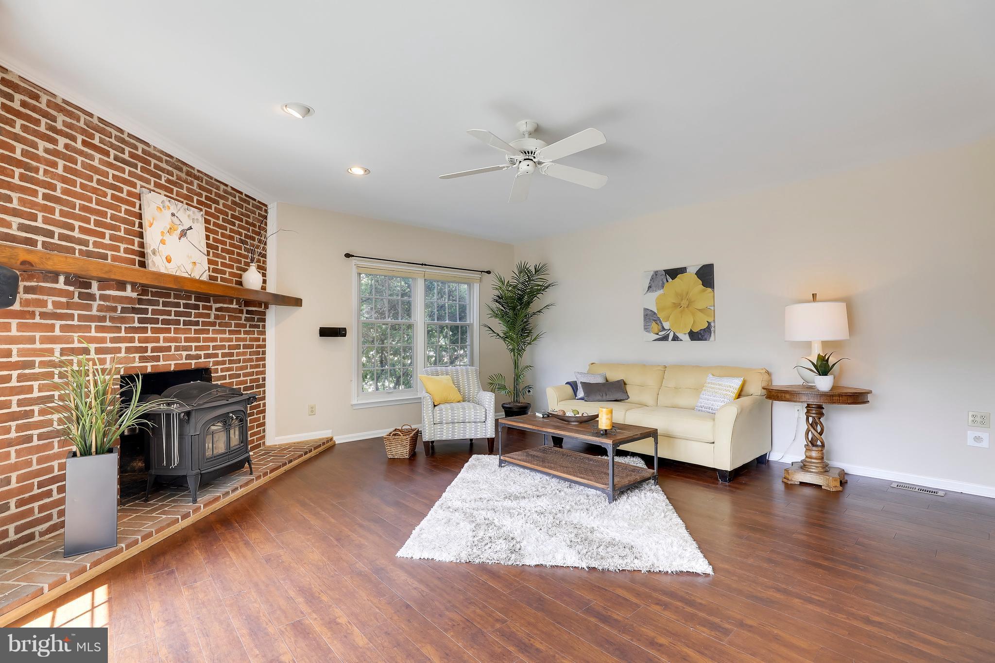 1476 Sharps Point Road Annapolis, MD 21409 - Photo 8 of 30 a living room with furniture or fireplace and a wooden floor