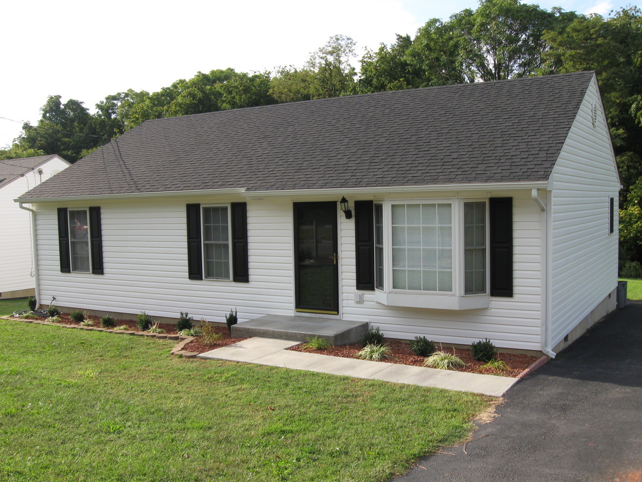 1116 Mountain View Road Vinton, VA 24179 - Photo 1 of 12 a front view of house with yard