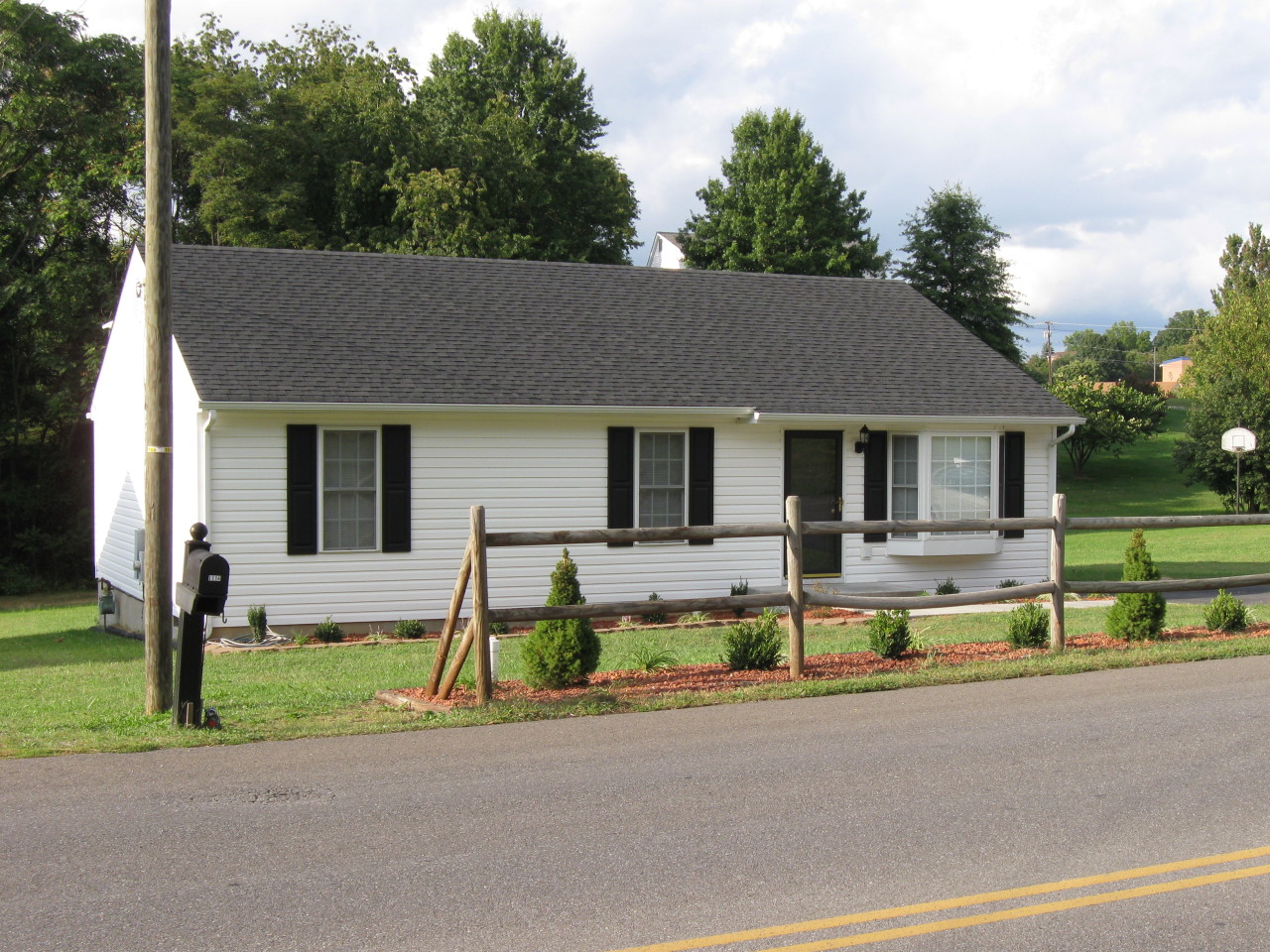 1116 Mountain View Road Vinton, VA 24179 - Photo 3 of 12 front view of a house with a yard