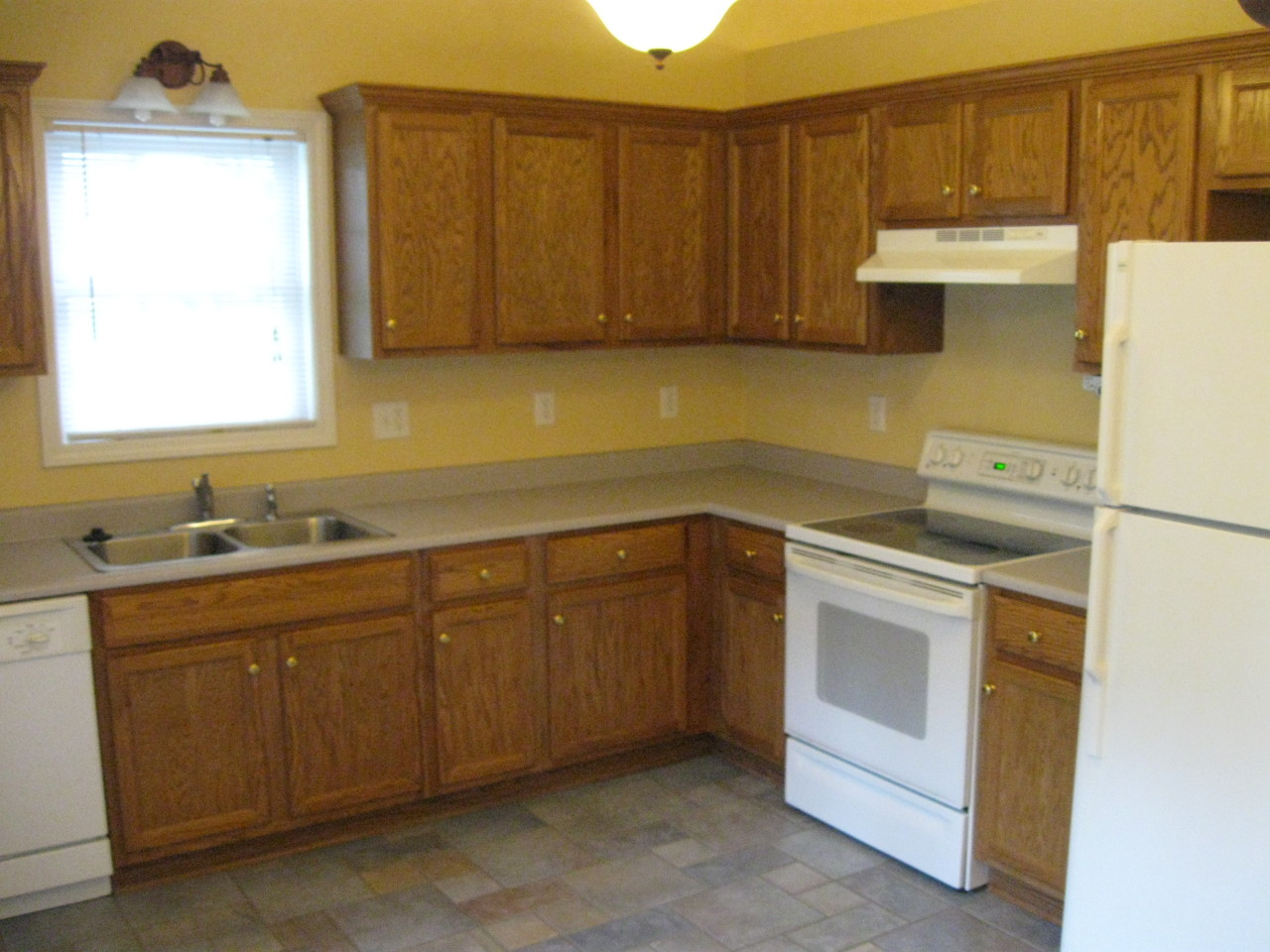 1116 Mountain View Road Vinton, VA 24179 - Photo 6 of 12 a kitchen with a sink cabinets and appliances