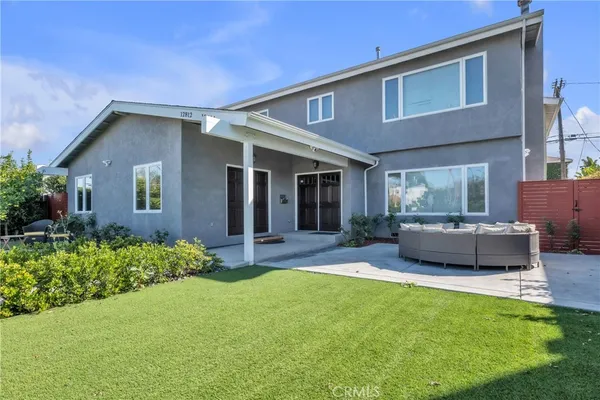a house view with a garden space