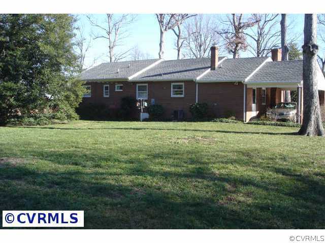 3740 Falstone Road Richmond, VA 23234 - Photo 2 of 10 a view of a house with a yard