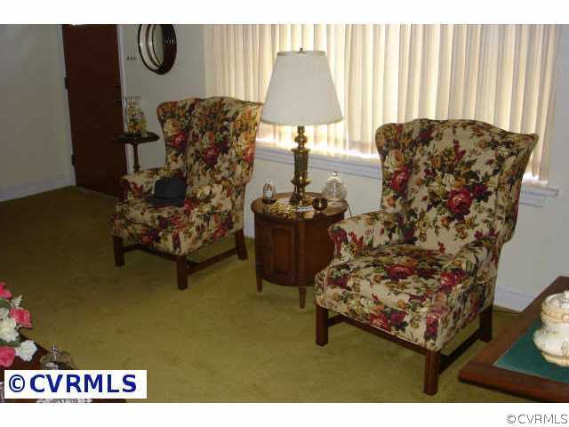 3740 Falstone Road Richmond, VA 23234 - Photo 3 of 10 a living room with furniture and a window