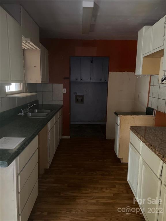 313 Old Barn Road Gold Hill, NC 28071 - Photo 3 of 9 a kitchen with a sink stove and cabinets