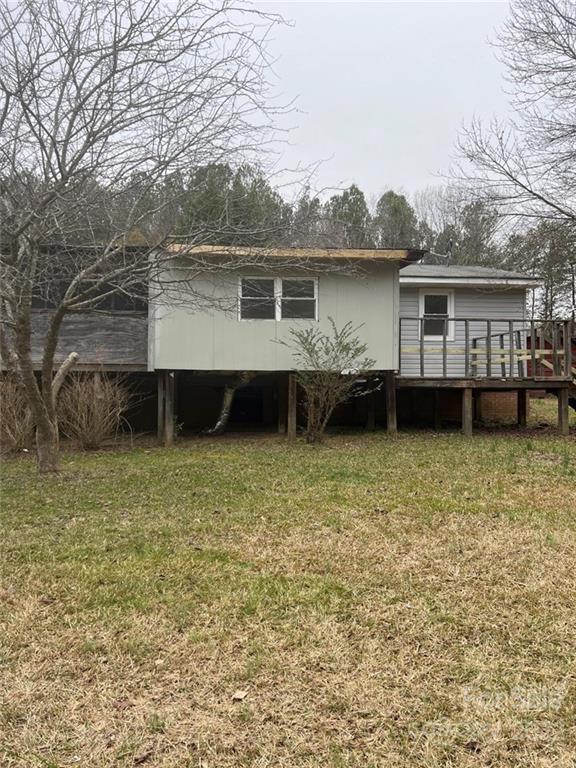 313 Old Barn Road Gold Hill, NC 28071 - Photo 8 of 9 a view of a house with a yard