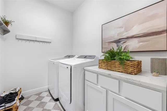 a utility room with washer and dryer