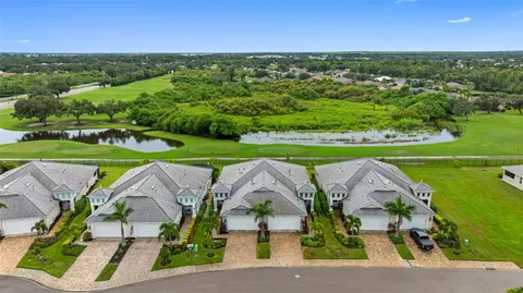 an aerial view of a yard with a garden and plants