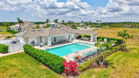 a view of a house with a garden and balcony