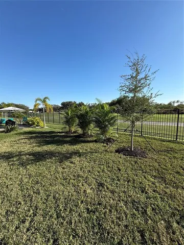 a view of a golf course with a garden