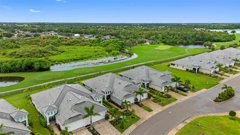an aerial view of a house with a garden