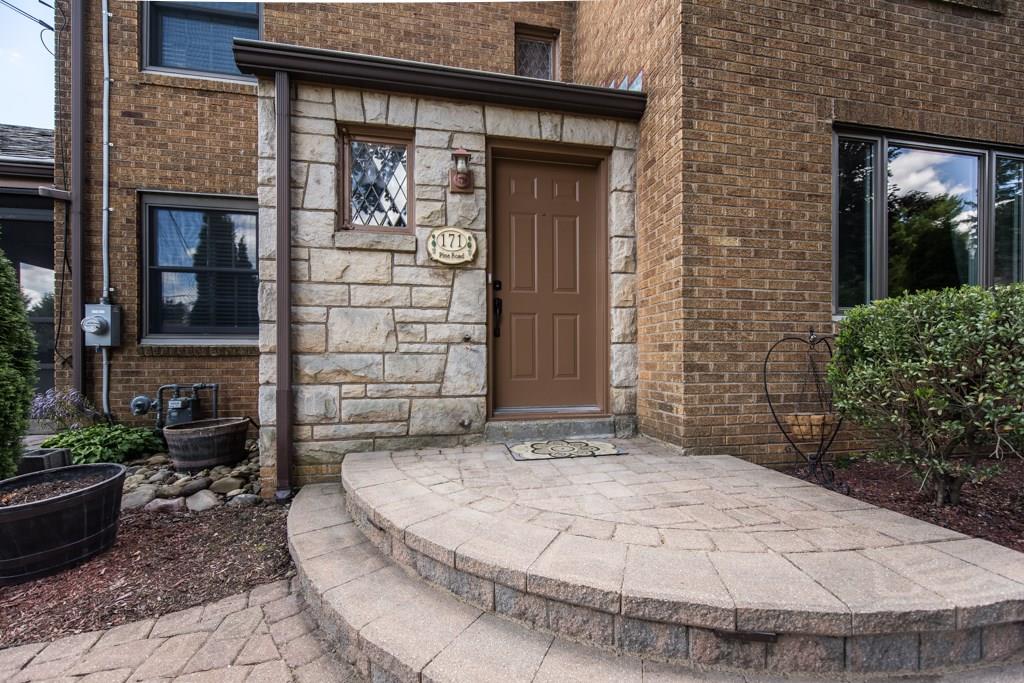 171 Pine Road Pittsburgh, PA 15237 - Photo 2 of 25 The stone entrance welcomes you home. The stone pavers and sidewalk add to the curb appeal.