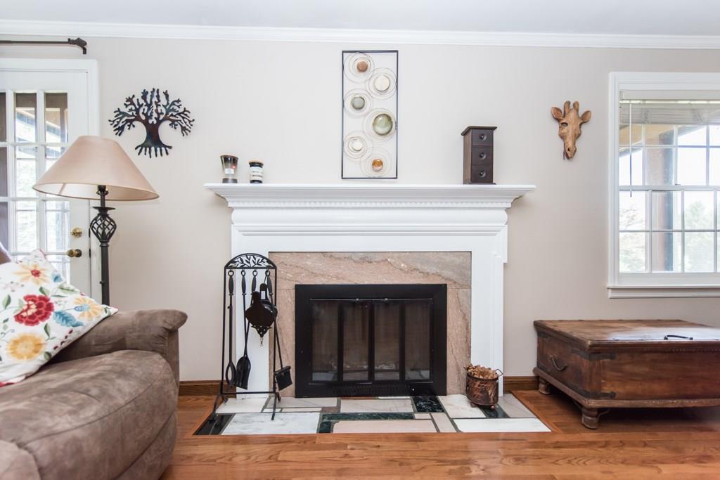 171 Pine Road Pittsburgh, PA 15237 - Photo 4 of 25 Lovely wood burning fireplace in living room with marble surround.
