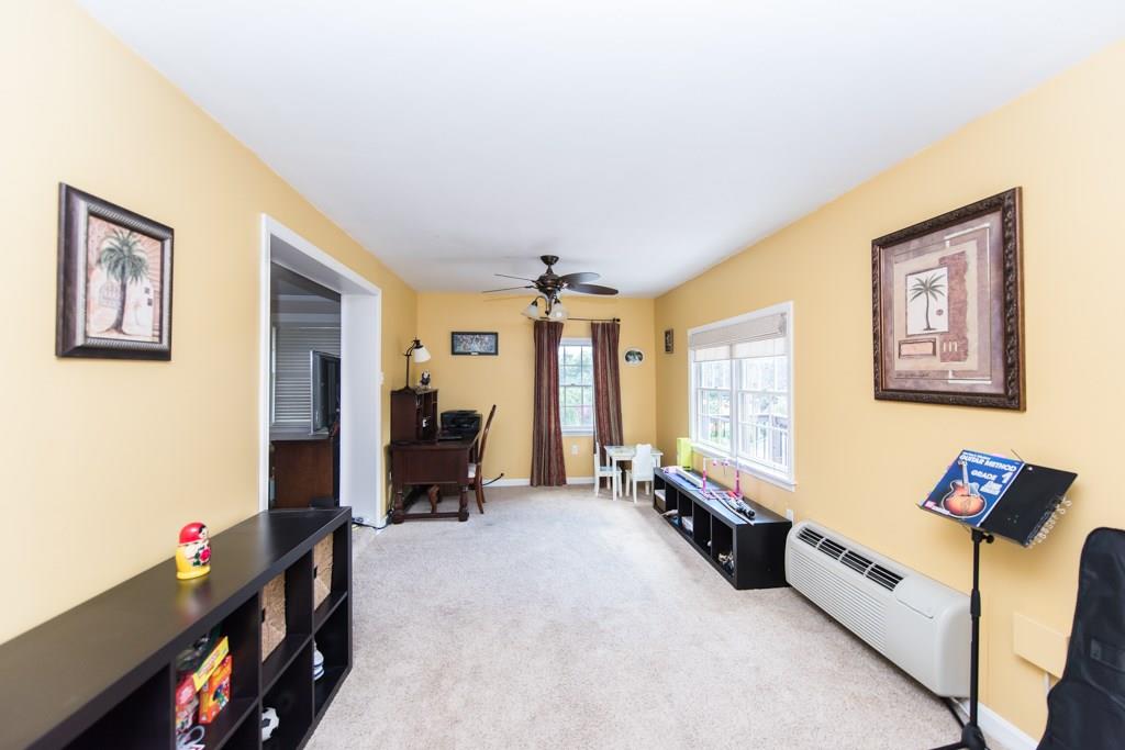 171 Pine Road Pittsburgh, PA 15237 - Photo 6 of 25 One step down to from the Living Room is the sunny Family Room. This space was converted from a back porch by the previous owners.