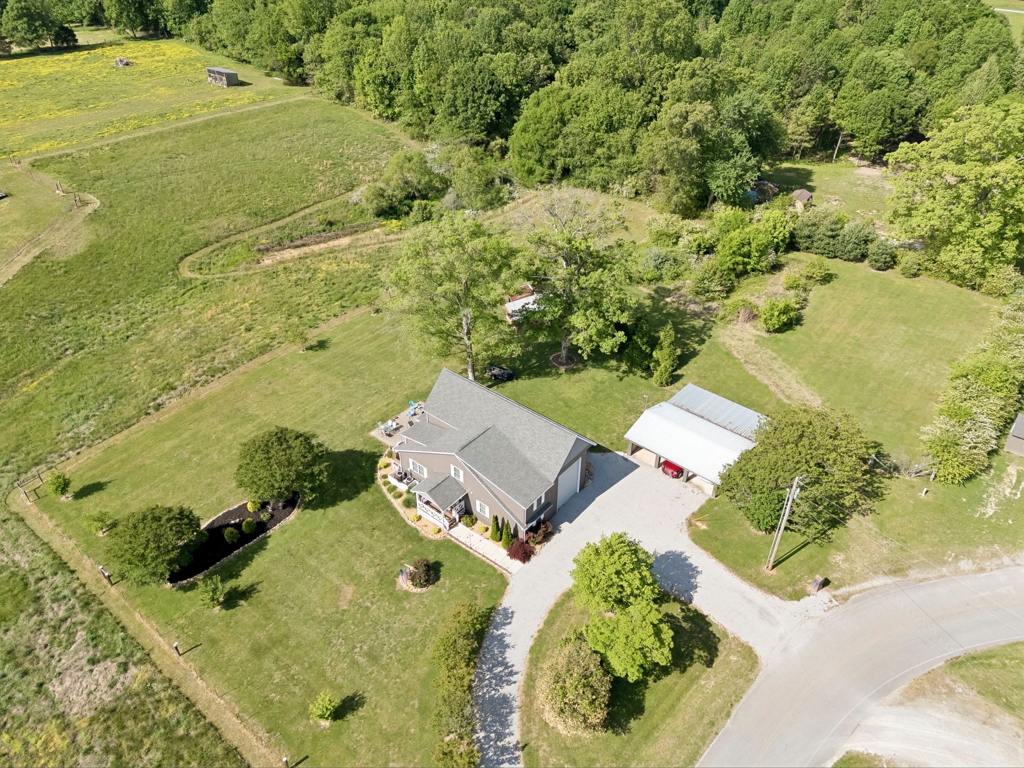 403 Bland Road Estill Springs, TN 37330 - Photo 63 of 66 an aerial view of residential houses with outdoor space