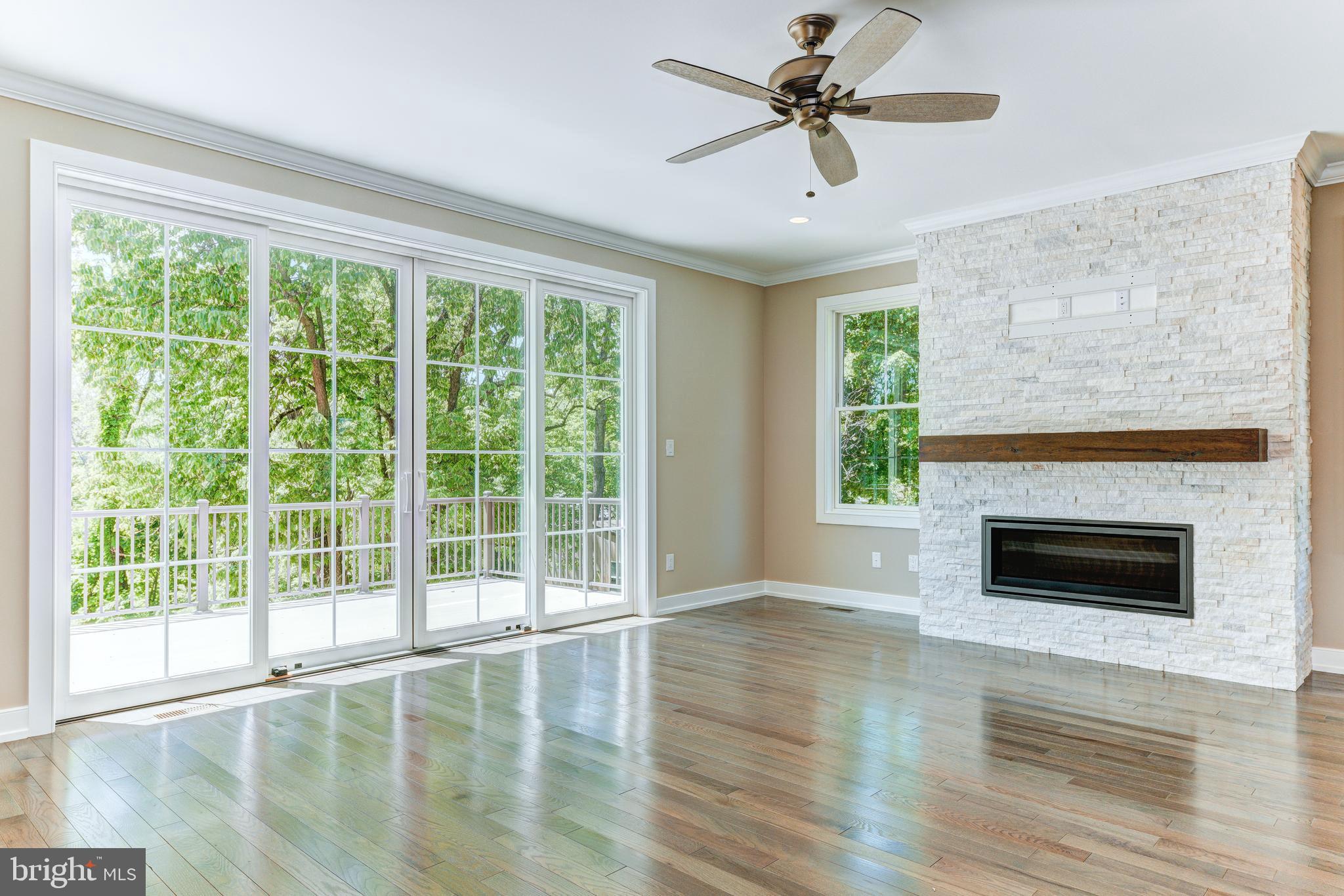 4520 Smith Road Buckingham, PA 18925 - Photo 17 of 28 Example of custom family room with contemporary FP