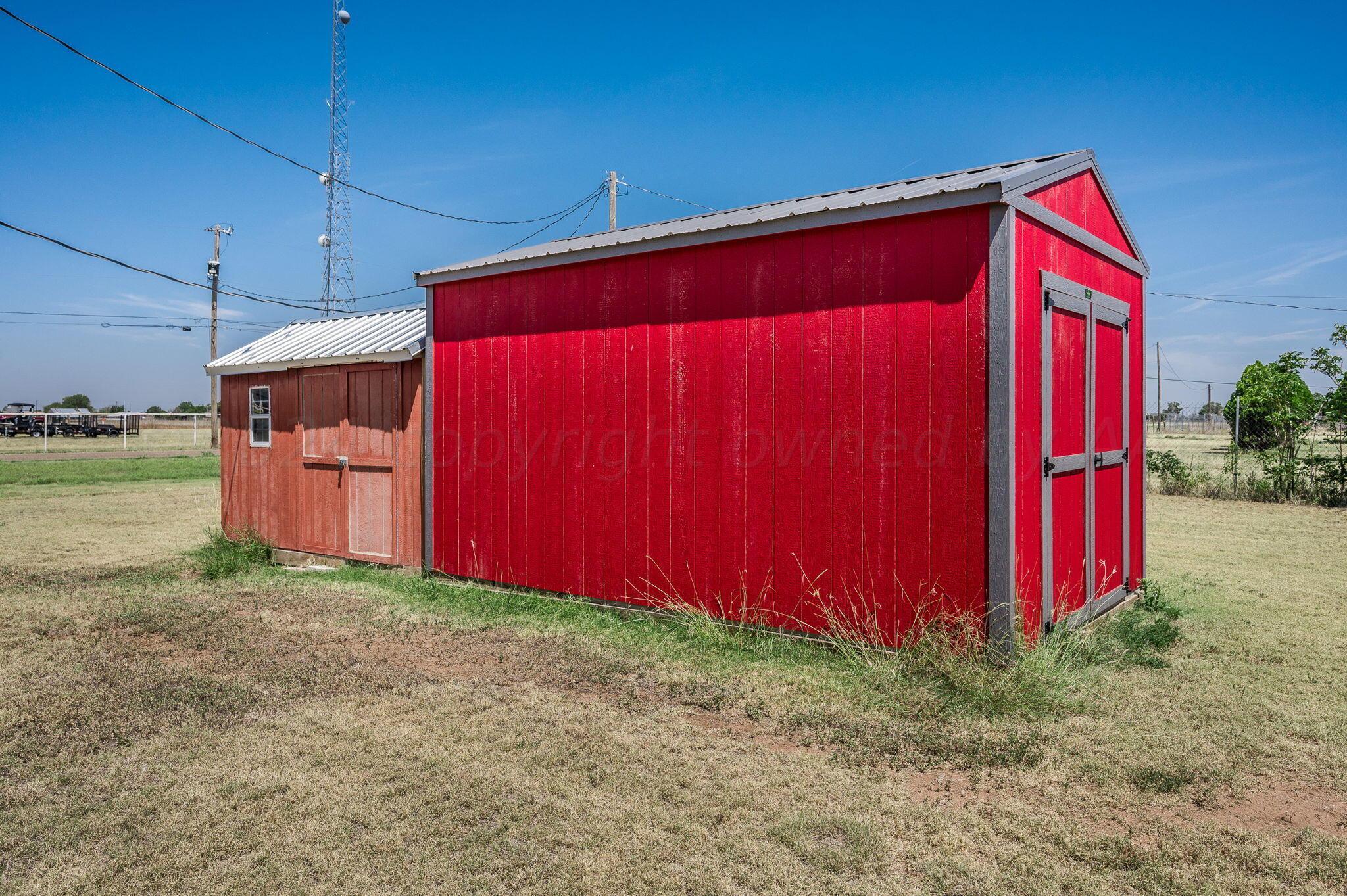11901 Ls Trail Amarillo, TX 79118 - Photo 13 of 14 a view of a backyard with potted plants
