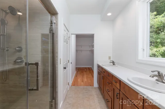 a bathroom with a sink and a window