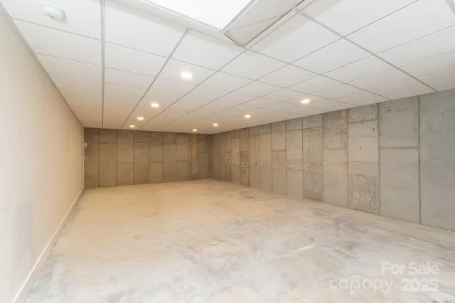 an empty room with wooden floor