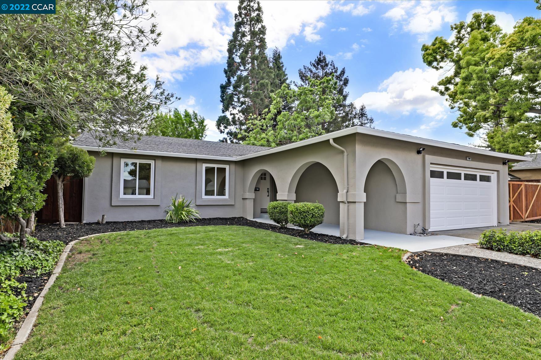 309 Almond Court San Ramon, CA 94583 - Photo 1 of 1 a front view of house with yard and green space