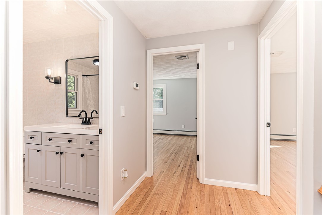 680 Fletcher Road North Kingstown, RI 02852 - Photo 24 of 41 Second floor view of bathroom with jacuzzi and doors into 2 of the bedrooms