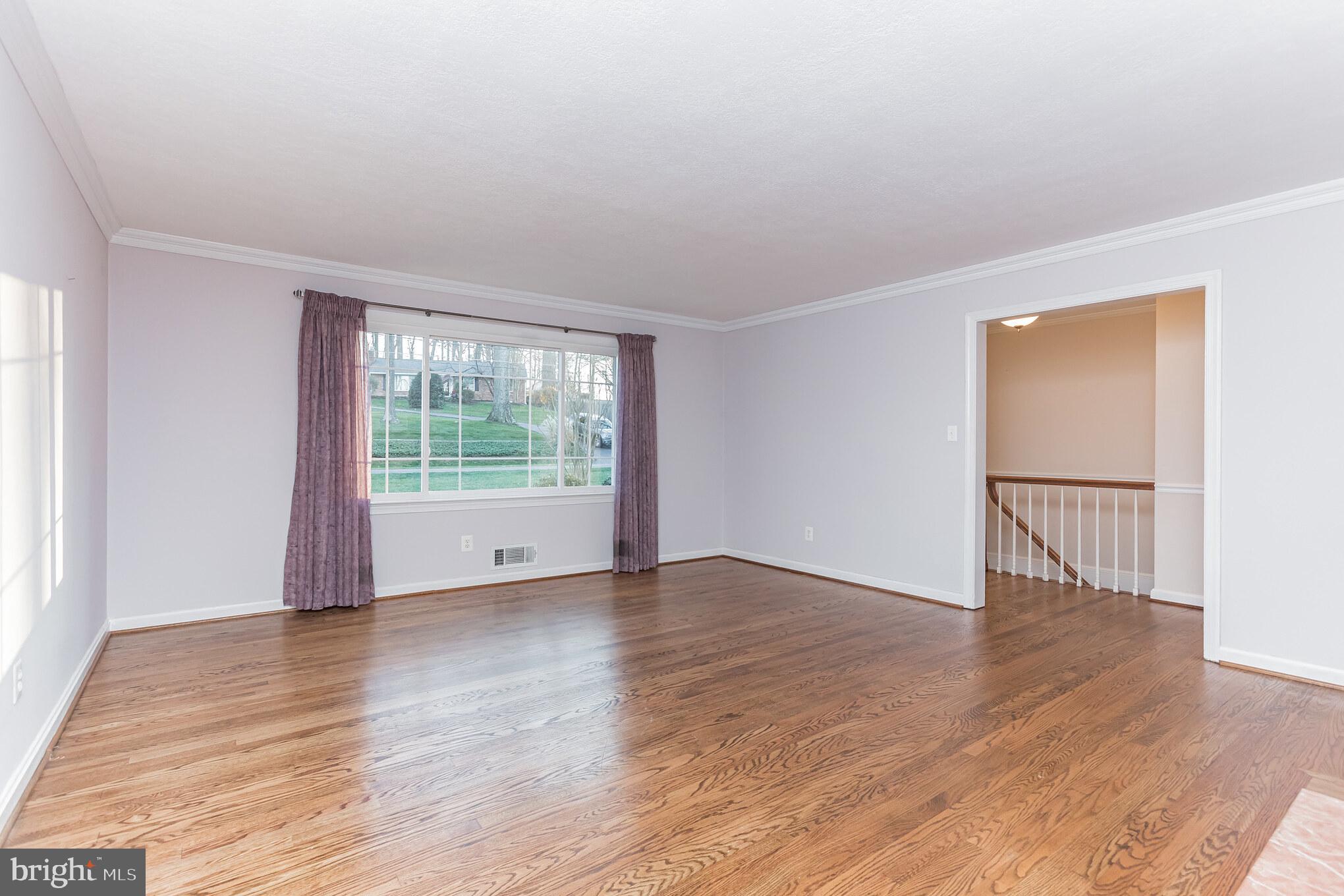 2009 Norvale Road Silver Spring, MD 20906 - Photo 2 of 30 Living room with crown molding