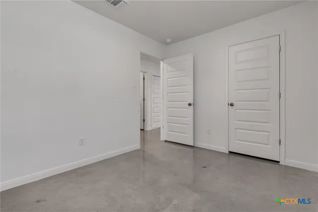 an empty room with closet