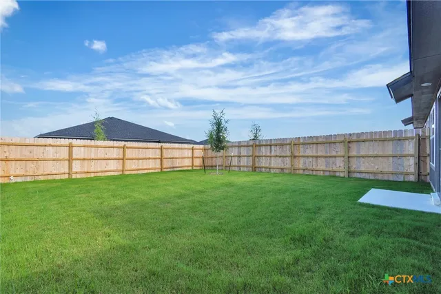 a view of outdoor space and yard
