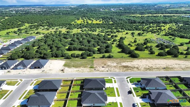 a view of swimming pool with a yard