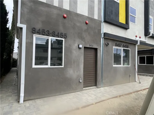 a front view of a house with windows