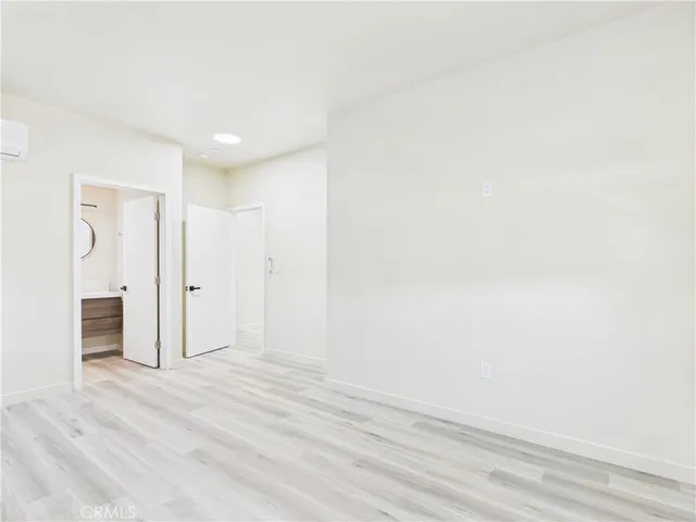 a view of a livingroom with wooden floor