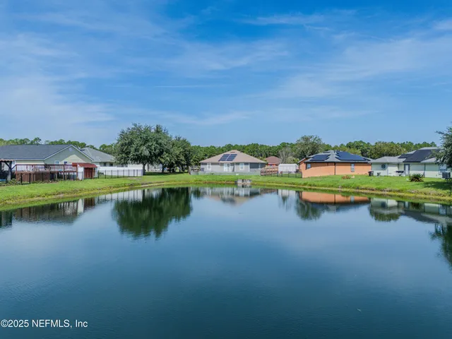 a view of a lake with houses