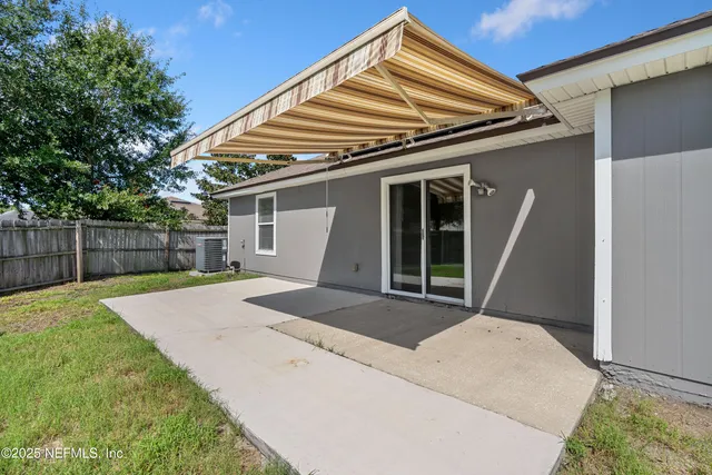 a front view of a house with garage