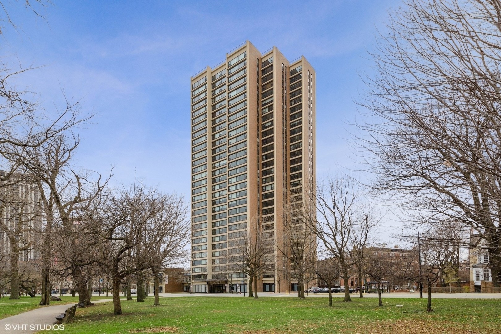 1850 North Clark Street, Unit 503 Chicago, IL 60614 - Photo 1 of 24 a front view of a building with large trees