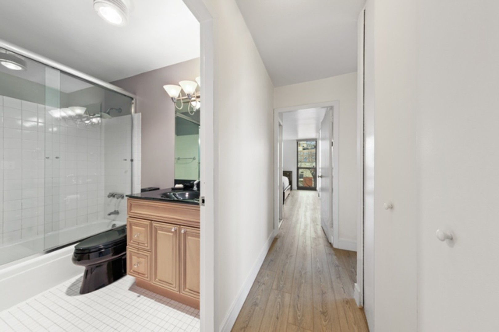 1850 North Clark Street, Unit 503 Chicago, IL 60614 - Photo 13 of 24 a view of a kitchen from the hallway